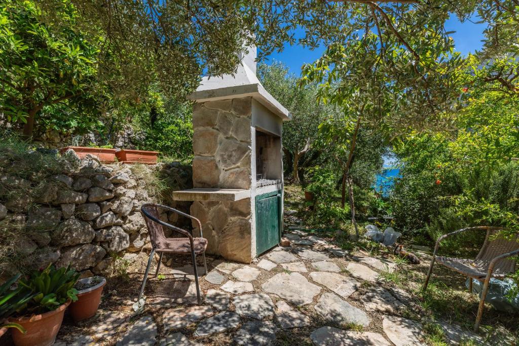 Stone barbecue in the family garden